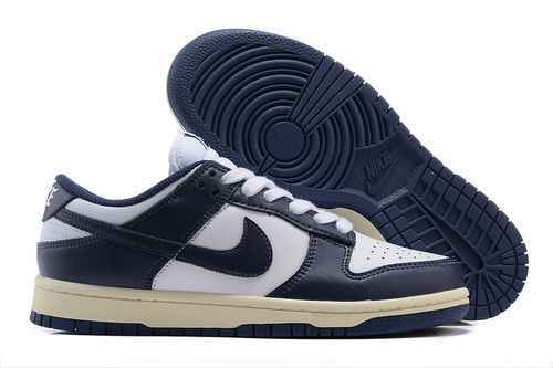 Nike Dunk Low WMNS Vintage Navy DD1503115 3645 con mezza taglia