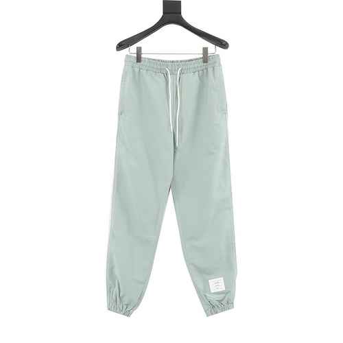 Pantaloni sportivi della linea TB in tessuto nylon