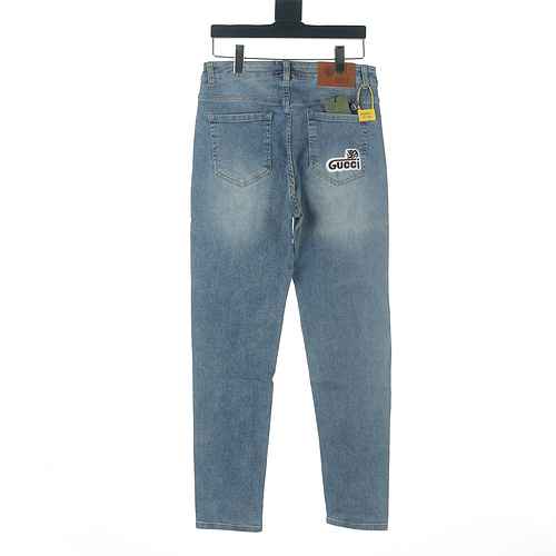 Gucci Jeans con lettera ricamata patch Gucci GUC