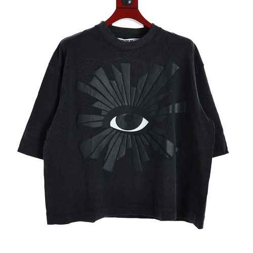 T-shirt a maniche corte allentata indossata con lettera in schiuma Truth Eye