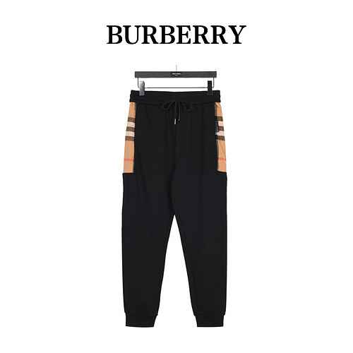 BurberryPantaloni classici in cotone patchwork a quadri laterali di Burberry