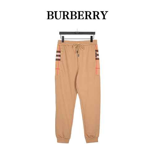 BurberryPantaloni classici in cotone patchwork a quadri laterali di Burberry