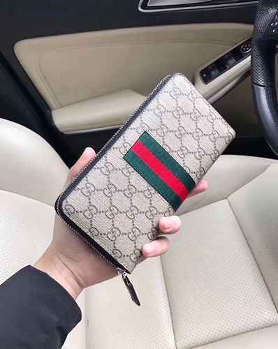 GUCCI Portafoglio da uomo con clip lungo dedicato realizzato in pelle bovina originale importata Con