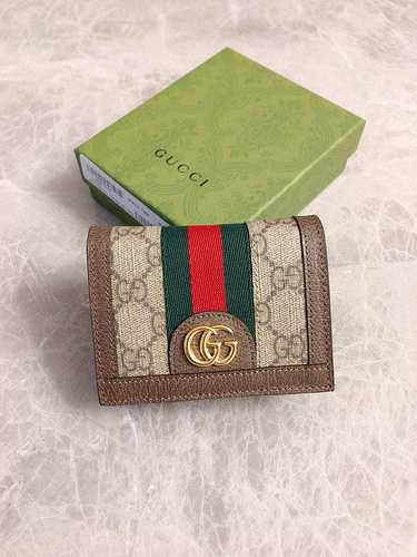 Il portafoglio GUCCI con clip corta adotta una borsa regalo originale importata in pelle bovina di a